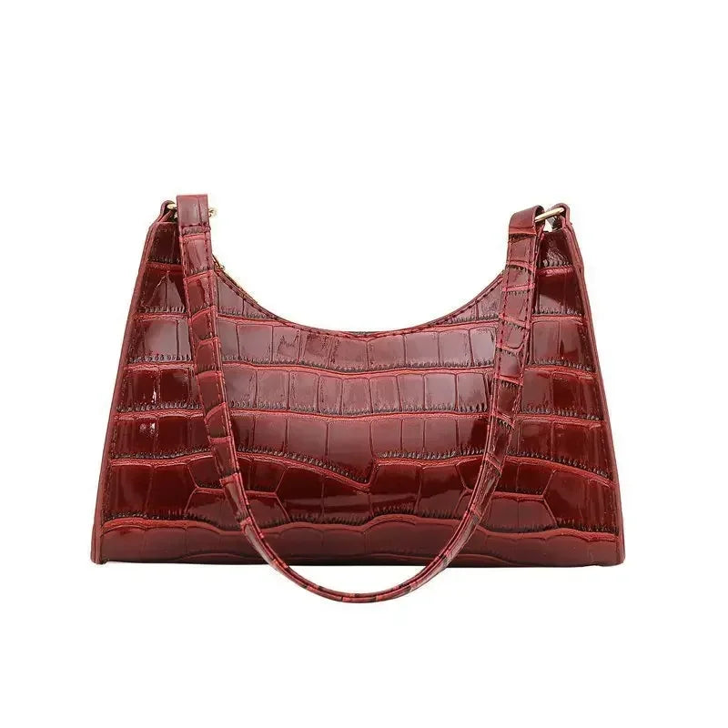 Sac de shopping élégant et raffiné pour femme : style rétro décontracté, porté épaule, en cuir uni.