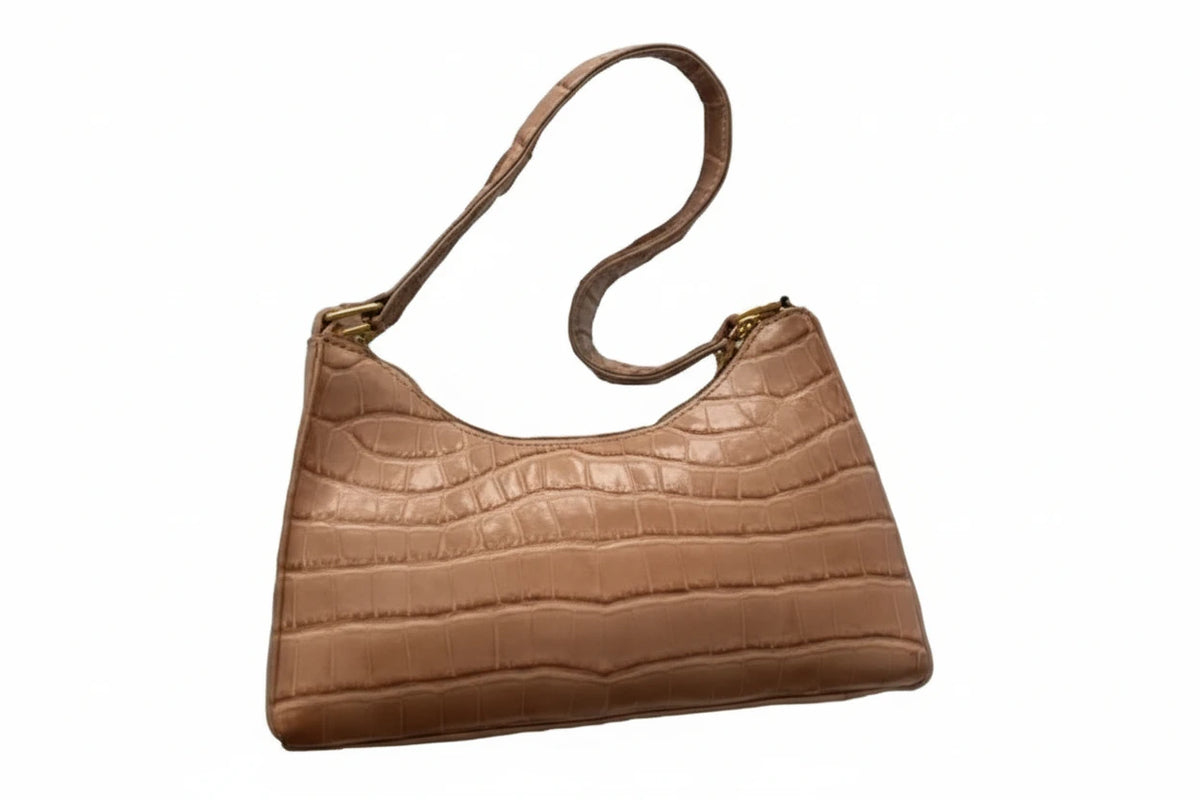 Sac de shopping élégant et raffiné pour femme : style rétro décontracté, porté épaule, en cuir uni.