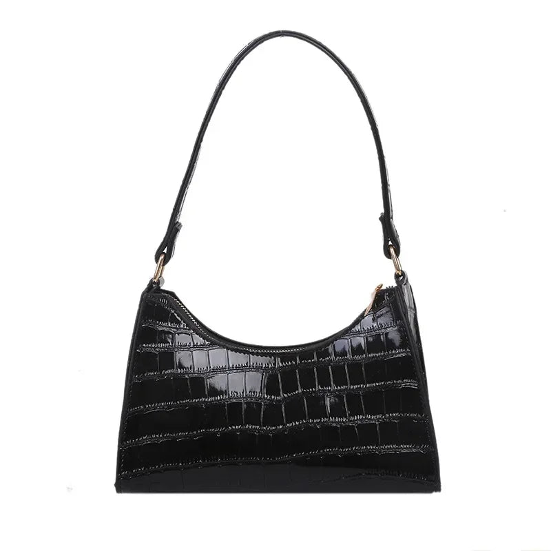 Sac de shopping élégant et raffiné pour femme : style rétro décontracté, porté épaule, en cuir uni.
