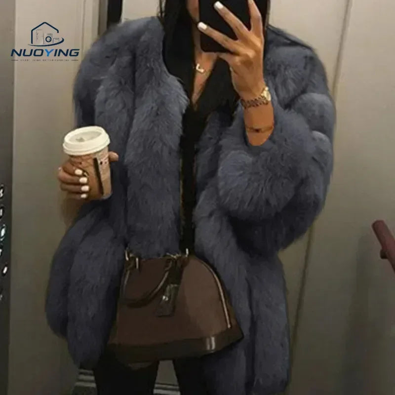 Veste courte et élégante en fausse fourrure pour femme (automne) : couleur unie, coupe oversize, manches longues bouffantes ; un modèle coupe-vent, léger et chaud, idéal pour les trajets quotidiens, les promenades en ville et les rendez-vous au café.