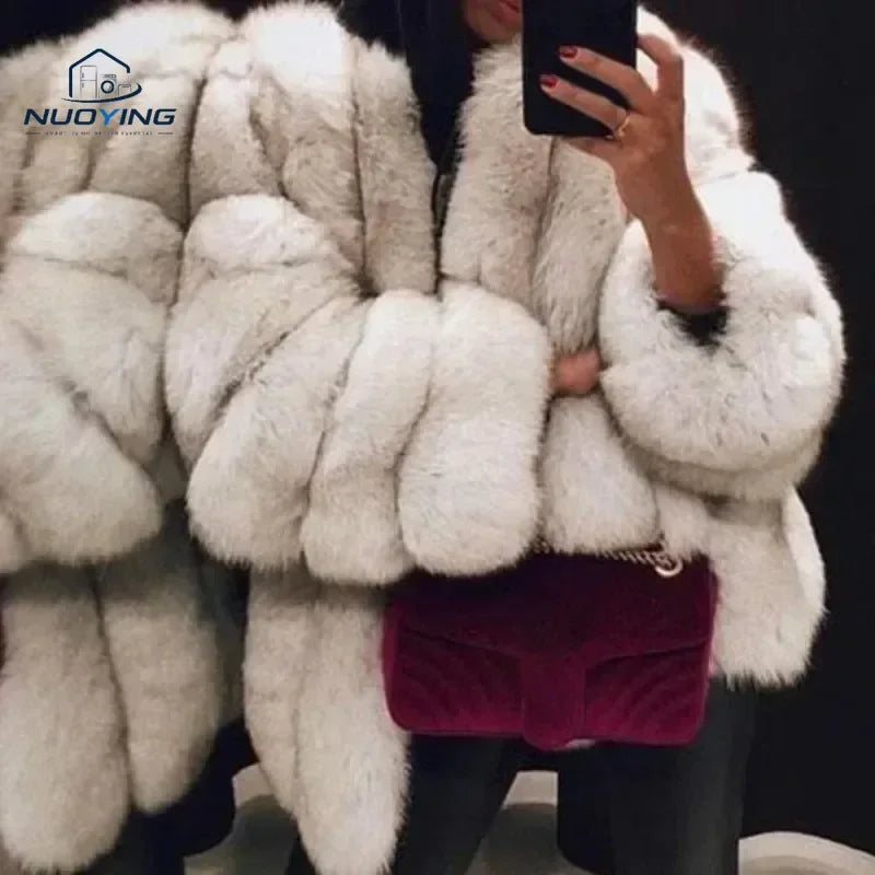 Veste courte et élégante en fausse fourrure pour femme (automne) : couleur unie, coupe oversize, manches longues bouffantes ; un modèle coupe-vent, léger et chaud, idéal pour les trajets quotidiens, les promenades en ville et les rendez-vous au café.