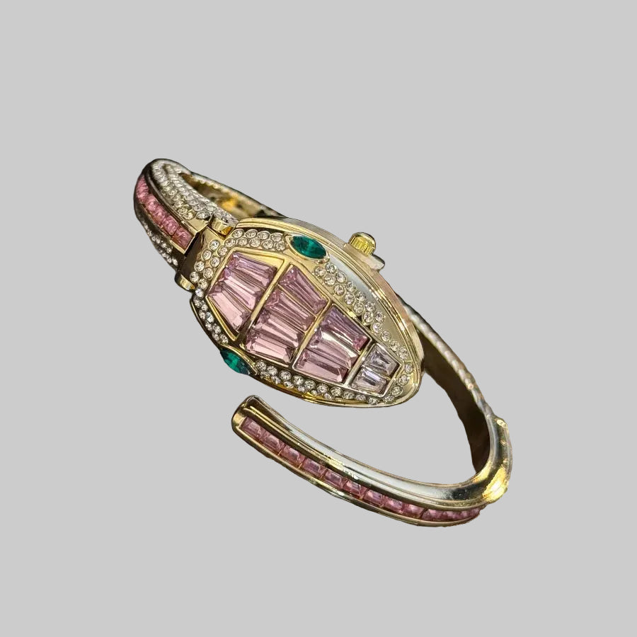 Montre-bracelet élégante pour femme en forme de serpent, ornée de diamants et au design européen et chic.