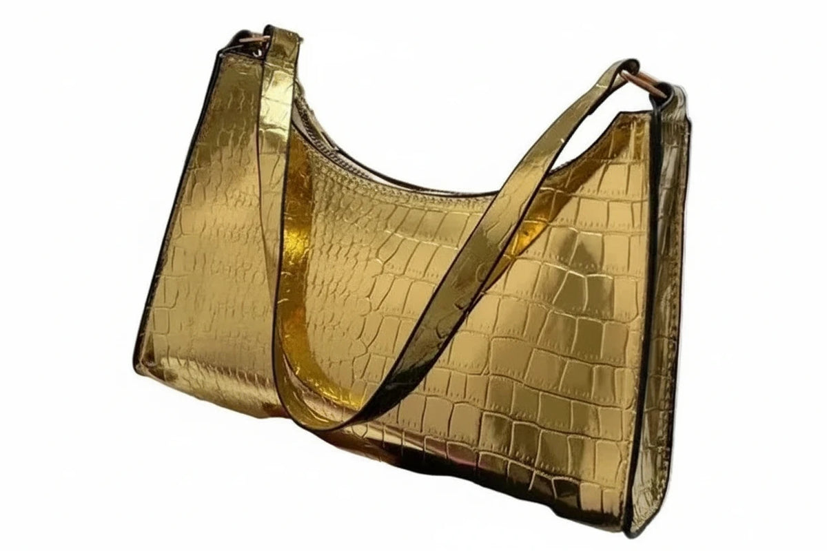 Sac de shopping élégant et raffiné pour femme : style rétro décontracté, porté épaule, en cuir uni.
